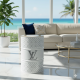 White Louis Vuitton Drum in a luxury Palm Beach living room overlooking the ocean